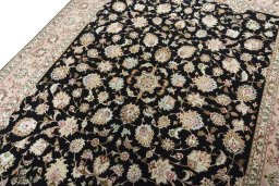 Backside of handmade New Tabriz 50/60/70 Raj rug showing knot structure and weave density