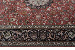 Corner detail of New Tabriz 50/60/70 Raj rug showing border pattern and Cork pile