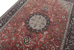 Backside of handmade New Tabriz 50/60/70 Raj rug showing knot structure and weave density