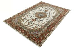 Corner detail of New Tabriz 50/60/70 Raj rug showing border pattern and Cork pile