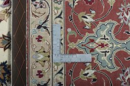 Backside of handmade 2000s Tabriz 50/60/70 Raj rug showing knot structure and weave density