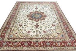 Surface texture of 2000s Tabriz 50/60/70 Raj rug with natural Cork and intricate pattern