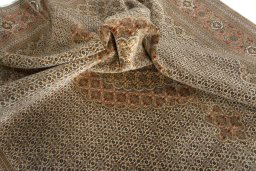 Surface texture of 2000s Tabriz 50/60/70 Raj rug with natural Cork and intricate pattern