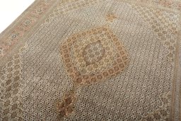 Backside of handmade 2000s Tabriz 50/60/70 Raj rug showing knot structure and weave density