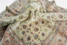 Surface texture of 2000s Tabriz 50/60/70 Raj rug with natural Cork and intricate pattern