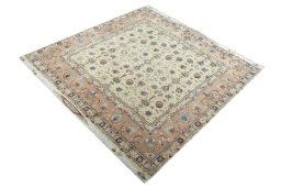 Corner detail of 2000s Tabriz 50/60/70 Raj rug showing border pattern and Cork pile