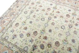 Backside of handmade 2000s Tabriz 50/60/70 Raj rug showing knot structure and weave density