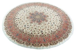 Corner detail of 2000s Tabriz 50/60/70 Raj rug showing border pattern and Cork pile