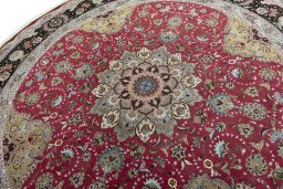 Backside of handmade New Tabriz 50/60/70 Raj rug showing knot structure and weave density