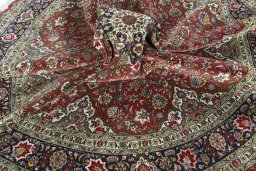 Corner detail of New Tabriz 50/60/70 Raj rug showing border pattern and Cork pile