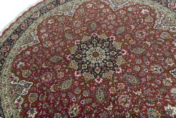 Backside of handmade New Tabriz 50/60/70 Raj rug showing knot structure and weave density