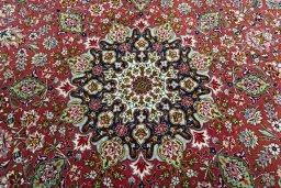 Central medallion detail of New Tabriz 50/60/70 Raj rug from Iran / Persia