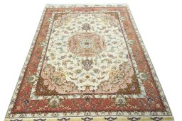 Surface texture of 2000s Tabriz 50/60/70 Raj rug with natural Cork and intricate pattern