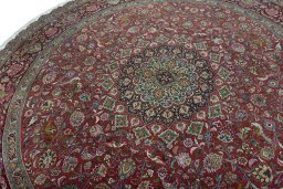 Backside of handmade New Tabriz 50/60/70 Raj rug showing knot structure and weave density