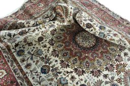Surface texture of 2000s Tabriz 50/60/70 Raj rug with natural Cork and intricate pattern