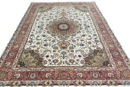 Surface texture of 2000s Tabriz 50/60/70 Raj rug with natural Cork and intricate pattern