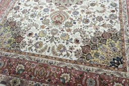 Close-up detail of 2000s Tabriz 50/60/70 Raj rug from Iran / Persia showing Cork weave