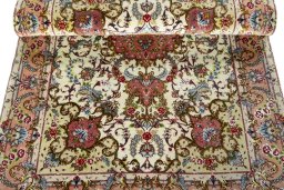 Surface texture of New Tabriz 50/60/70 Raj rug with natural Cork and intricate pattern