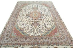 Surface texture of 2000s Tabriz 50/60/70 Raj rug with natural Cork and intricate pattern