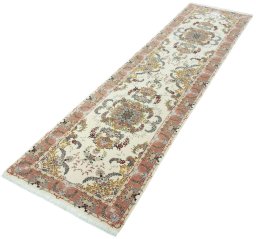 Corner detail of New Tabriz 50/60/70 Raj rug showing border pattern and Cork pile