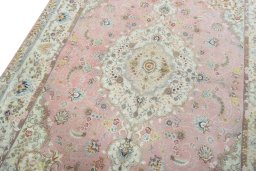 Backside of handmade 2000s Tabriz 50/60/70 Raj rug showing knot structure and weave density