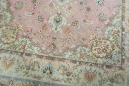 Close-up detail of 2000s Tabriz 50/60/70 Raj rug from Iran / Persia showing Cork weave