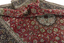 Surface texture of 2000s Tabriz 50/60/70 Raj rug with natural Cork and intricate pattern