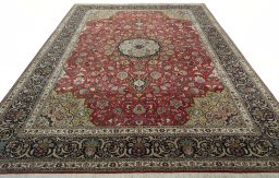 Surface texture of 2000s Tabriz 50/60/70 Raj rug with natural Cork and intricate pattern