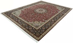Corner detail of 2000s Tabriz 50/60/70 Raj rug showing border pattern and Cork pile