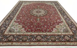 Surface texture of 2000s Tabriz 50/60/70 Raj rug with natural Cork and intricate pattern