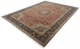Corner detail of 2000s Tabriz 50/60/70 Raj rug showing border pattern and Cork pile