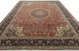 Surface texture of 2000s Tabriz 50/60/70 Raj rug with natural Cork and intricate pattern