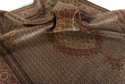Surface texture of 2000s Tabriz 50/60/70 Raj rug with natural Cork and intricate pattern