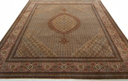 Surface texture of 2000s Tabriz 50/60/70 Raj rug with natural Cork and intricate pattern