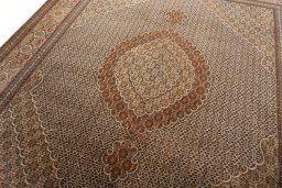 Backside of handmade 2000s Tabriz 50/60/70 Raj rug showing knot structure and weave density
