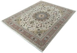 Corner detail of 2000s Tabriz 50/60/70 Raj rug showing border pattern and Cork pile