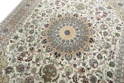 Backside of handmade 2000s Tabriz 50/60/70 Raj rug showing knot structure and weave density