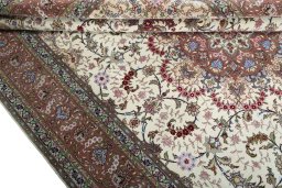 Close-up detail of 2000s Tabriz 50/60/70 Raj rug from Iran / Persia showing Cork weave