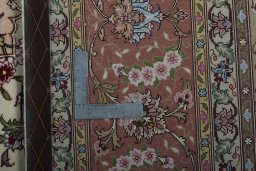 Backside of handmade 2000s Tabriz 50/60/70 Raj rug showing knot structure and weave density