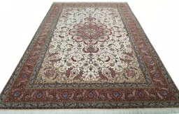 Surface texture of 2000s Tabriz 50/60/70 Raj rug with natural Cork and intricate pattern