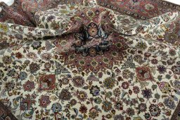 Surface texture of 2000s Tabriz 50/60/70 Raj rug with natural Cork and intricate pattern