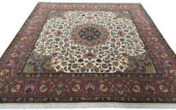 Surface texture of 2000s Tabriz 50/60/70 Raj rug with natural Cork and intricate pattern