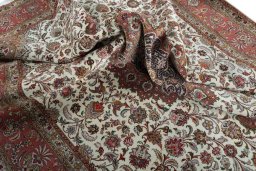 Surface texture of 2000s Tabriz 50/60/70 Raj rug with natural Cork and intricate pattern