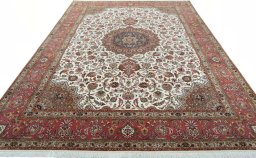 Surface texture of 2000s Tabriz 50/60/70 Raj rug with natural Cork and intricate pattern