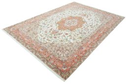 Corner detail of 2000s Tabriz 50/60/70 Raj rug showing border pattern and Cork pile