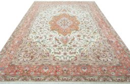 Surface texture of 2000s Tabriz 50/60/70 Raj rug with natural Cork and intricate pattern