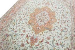 Backside of handmade 2000s Tabriz 50/60/70 Raj rug showing knot structure and weave density