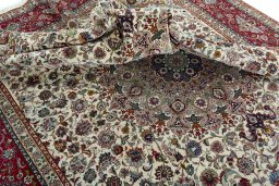 Surface texture of 2000s Tabriz 50/60/70 Raj rug with natural Cork and intricate pattern
