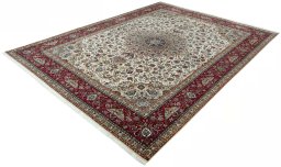 Corner detail of 2000s Tabriz 50/60/70 Raj rug showing border pattern and Cork pile