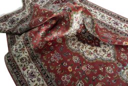 Surface texture of 2000s Tabriz 50/60/70 Raj rug with natural Cork and intricate pattern